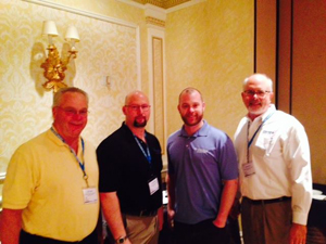 Stevens Worldwide Van Lines Western Sales Conference Ed Tuohy, Owner of Mountain Moving & Storage, Doug Kentfield, Patrick Tuohy, Mountain Moving, and Roger Wise, VP of Agency Development at Stevens Worldwide Van Lines — in Las Vegas, NV.