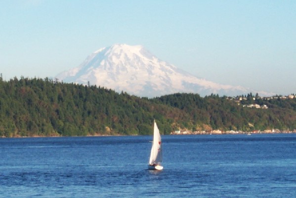Sail boat in Gig Harbor with Mount Rainier in background