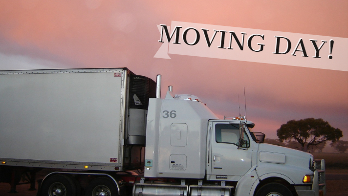 Moving Day truck driving during sunset