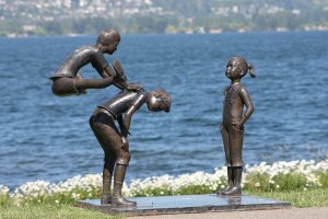 statue of kids near Kirkland's waterfront
