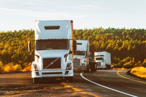 moving trucks on the side of the road