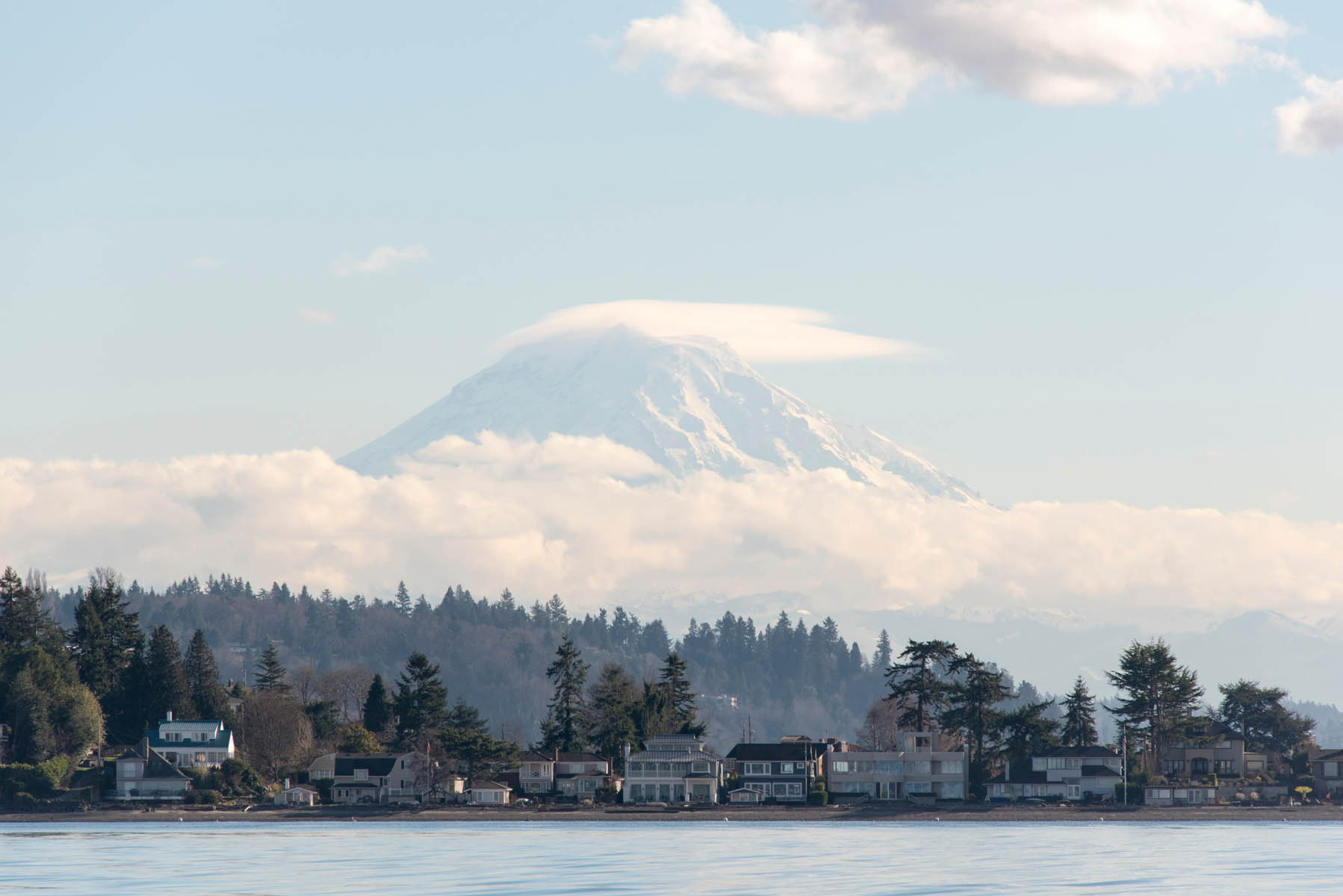 US, WA, Mt Rainier with cap cloud. Three Tree Point, Burien foreground