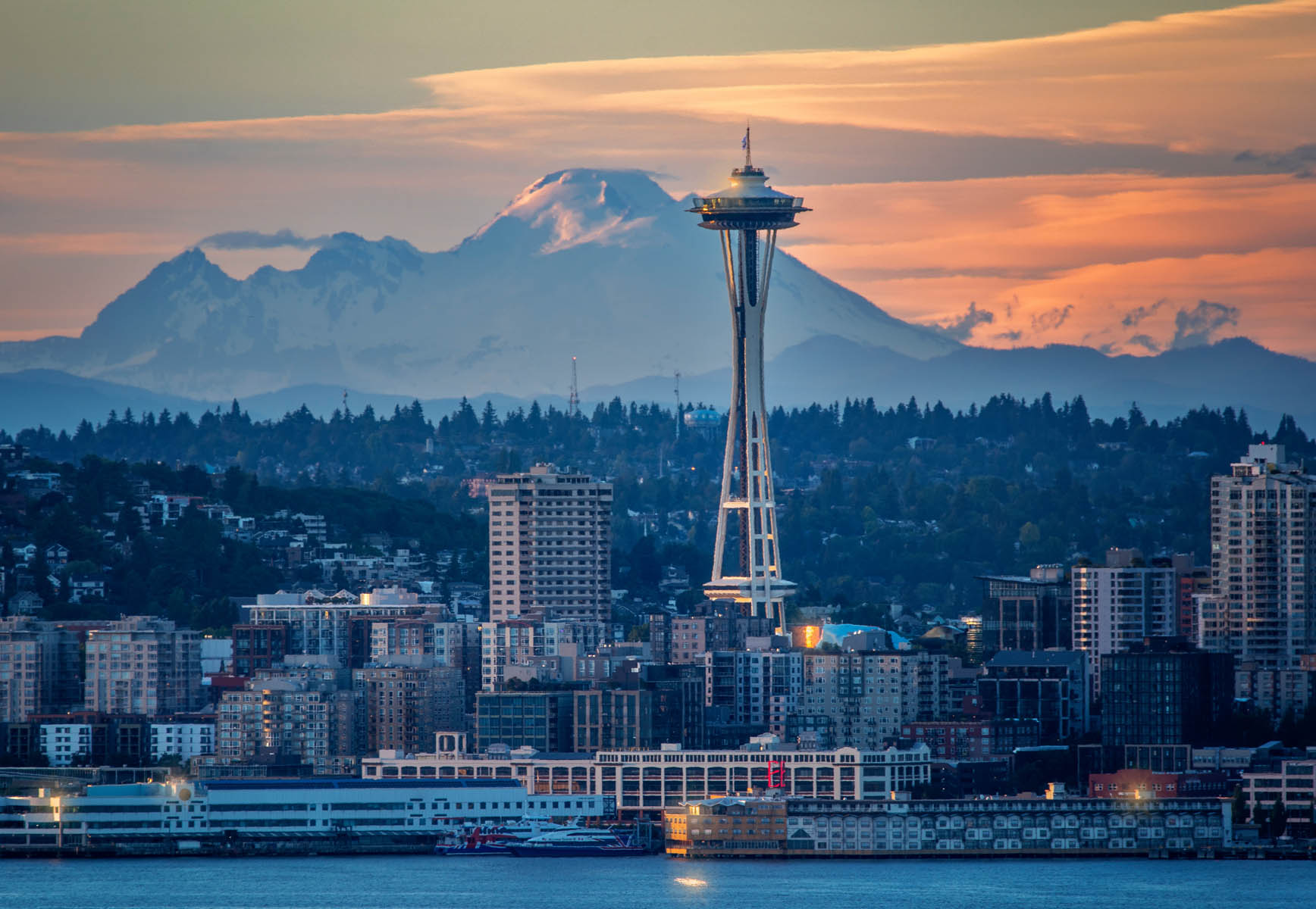 Seattle From Far Away with mountain tops on the horizon